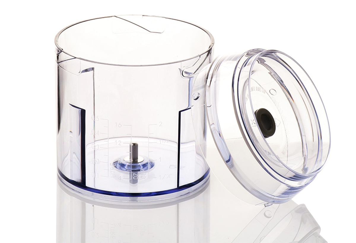 Απεικονίζεται το δοχείο της συσκευής ανοιχτό.